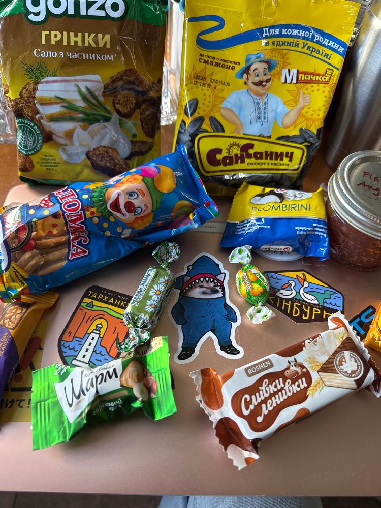 A wide assortment of Ukrainian treats and sweets, and a homemade fig jam in a jar