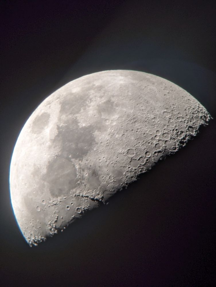 The moon, viewed through a home telescope