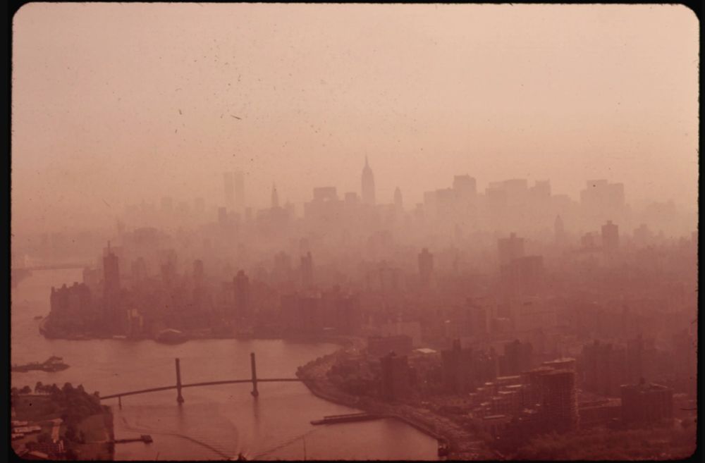 A vintage photo from the National Archives shows smog hanging over the New York skyline