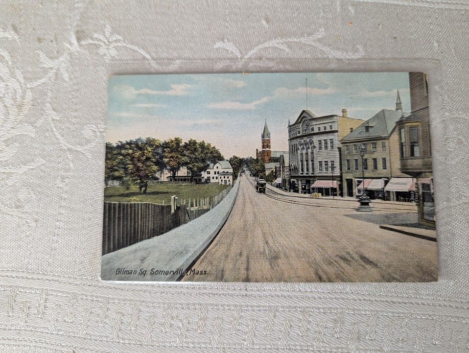 Postcard of Gilman Sq (a couple building landmarks remain today, but there is significantly less greenery)