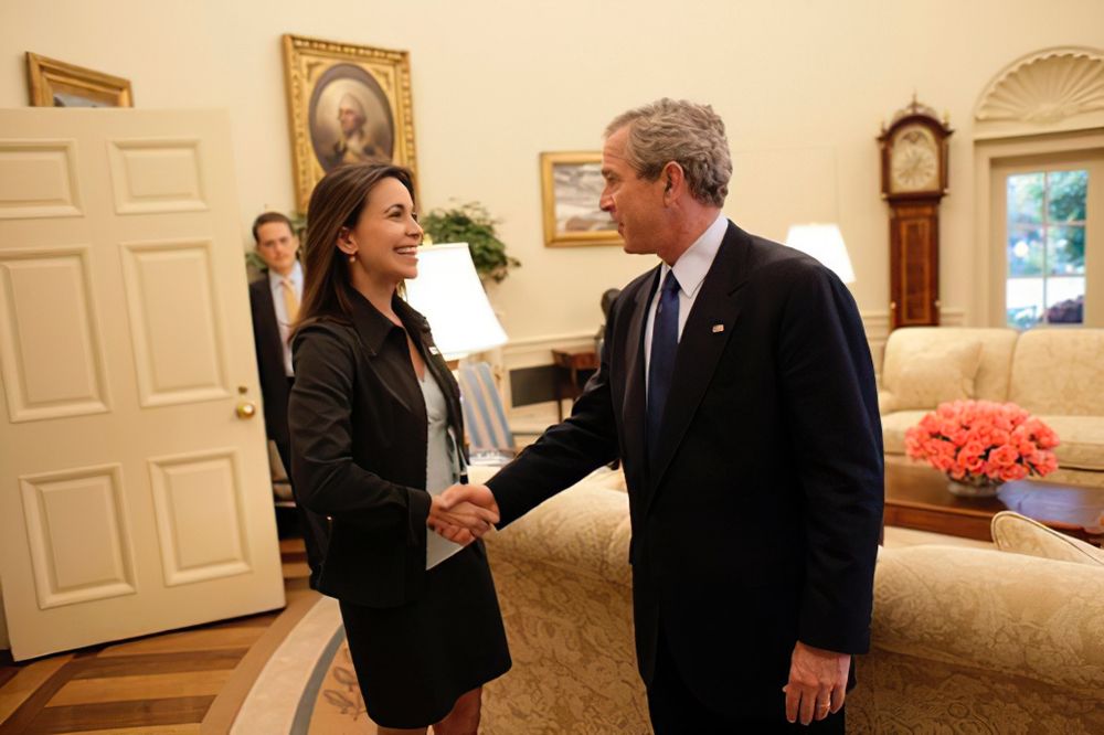 nobel peace prize recepient maria corina machado meeting war criminal george w bush at the white house in 2005