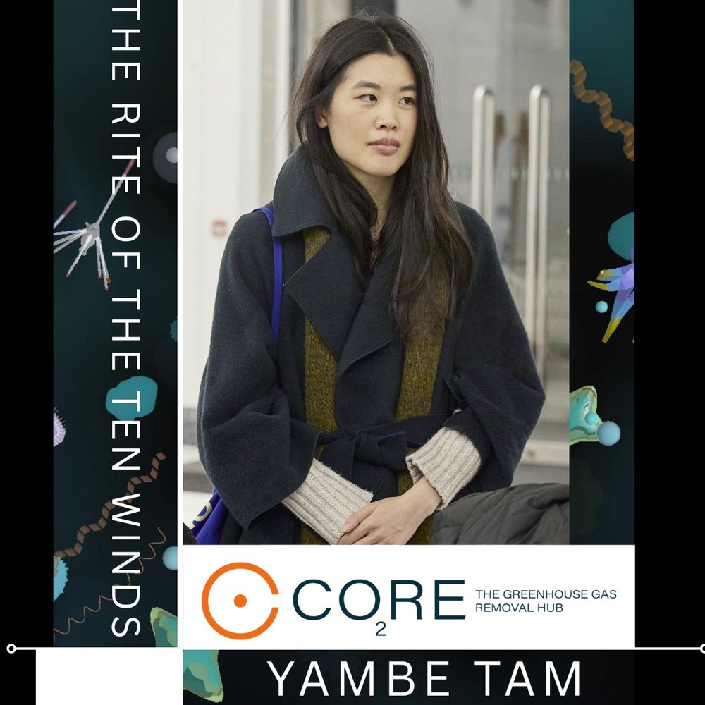 A woman sits looking off camera with double glass doors behind her. She has long dark hair and is wearing a dark blue coat with dark yellow-green trim. She is wearing a cream jumper that comes down past the coat sleeves. To her left is vertical text that reads, "The Rite of the Ten Winds". This is the name of the artistic project she is undertaking. Below is the CO2RE logo and the artists name (Yambe Tam). 