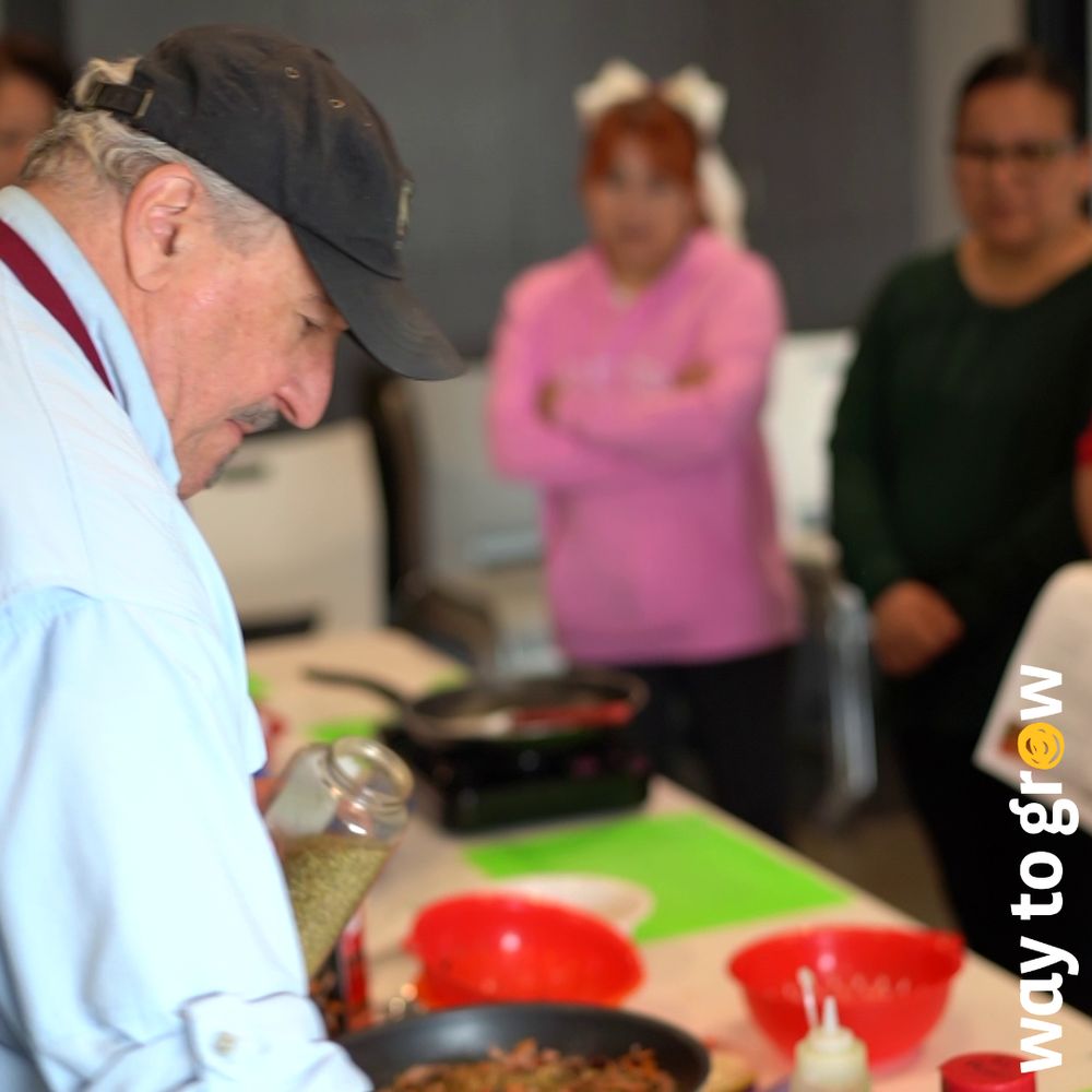 Chef Peter leading a family cooking class session