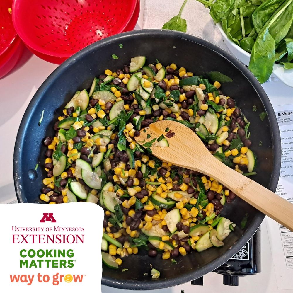 Colorful bean and corn dish prepared during a family cooking class