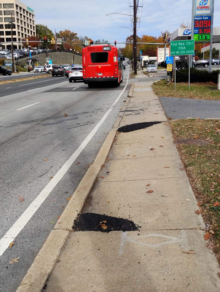 Fixed sidewalk along Colesville Road 