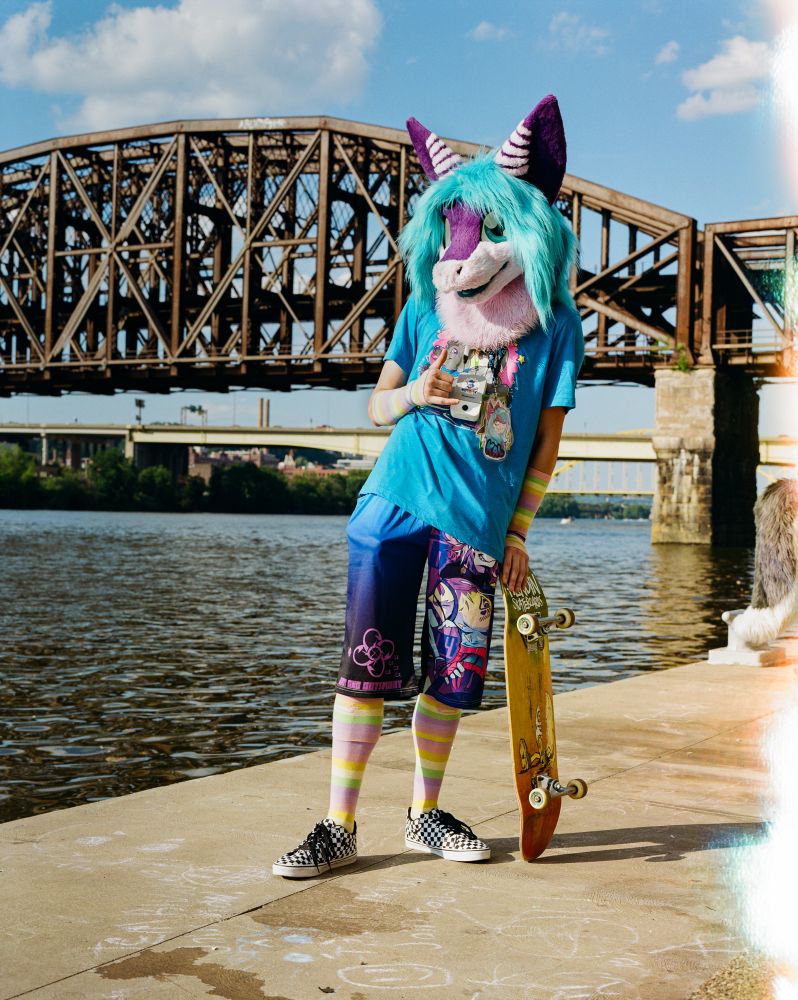 Kal standing by the water at Anthrocon’s waterfront.