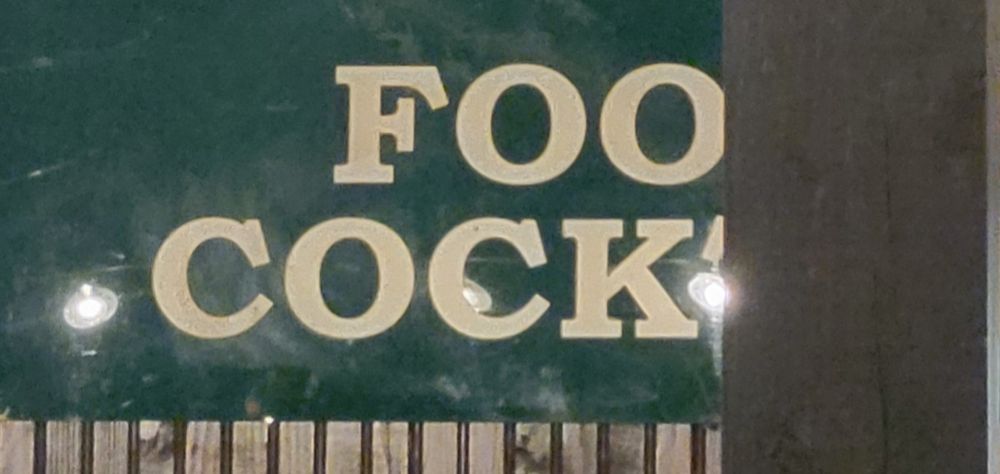 Zoomed-in view of the "Foo Cock" text