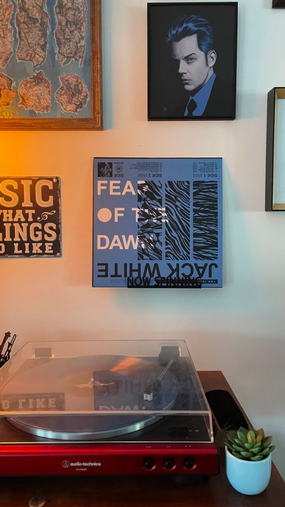 A picture of a record player with the album Fear of the Dawn by Jack White, an incredible album. Blue Heart 💙 