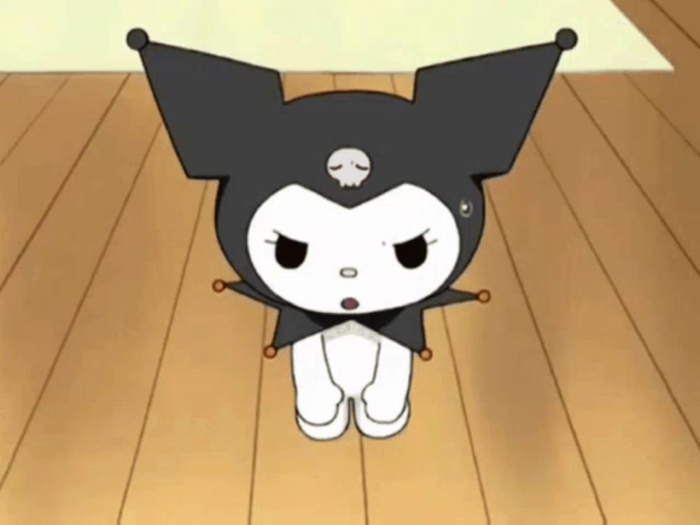 a black and white cartoon character with a skull on her hat