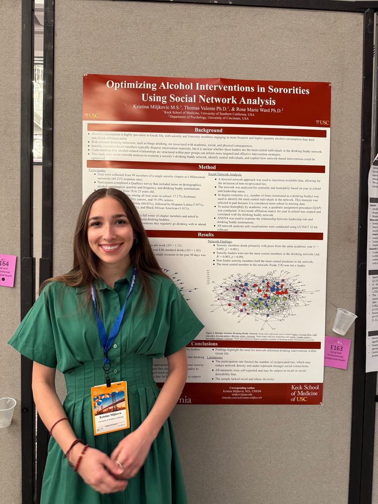 women with poster presentation