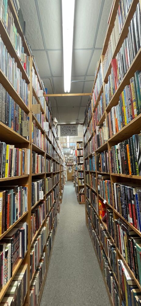 An aisle in a second-hand bookstore