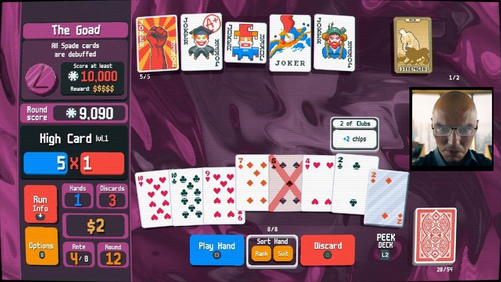 A picture of Nicholas Hoult edited with a pair of glasses, superimposed onto gameplay of Balatro