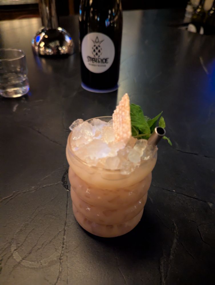 A tiki style cocktail on crushed ice.