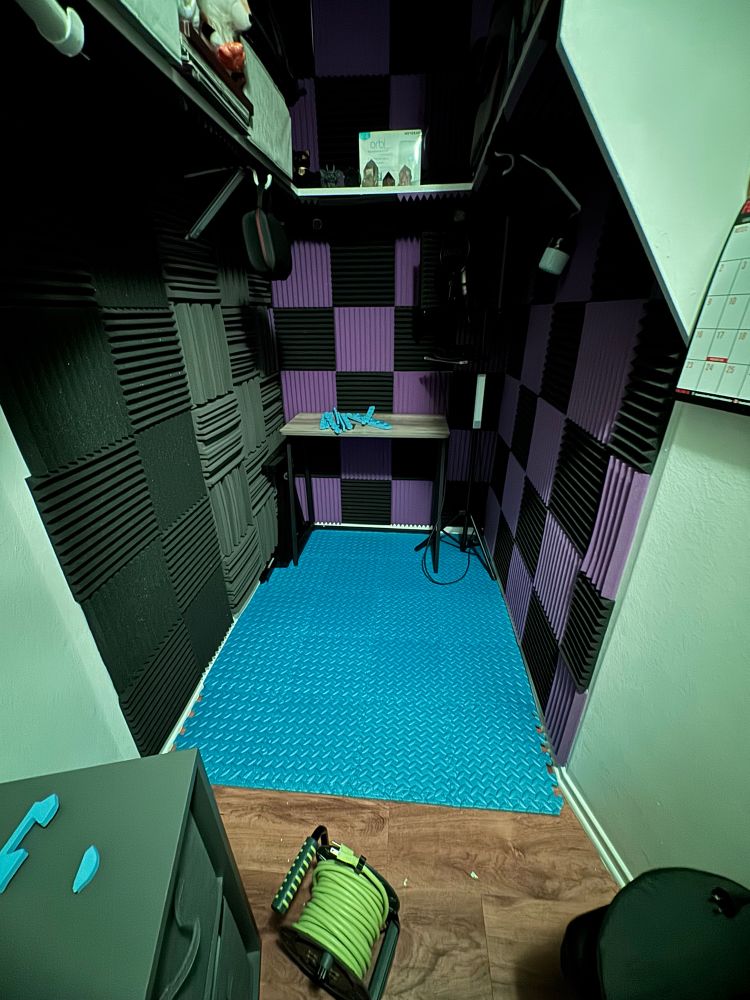 Closet home studio with acoustic foam treatment