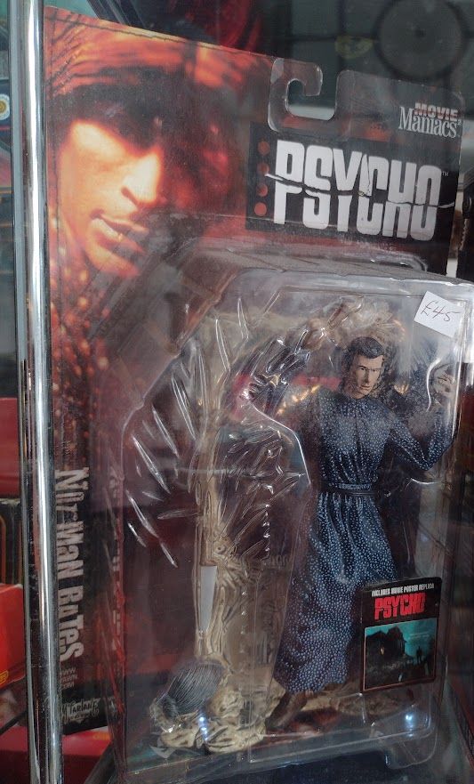 Norman Bates action figure. In a dress.