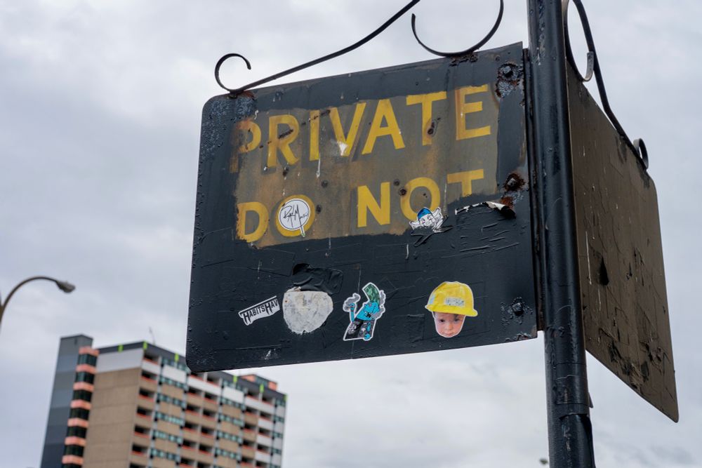 Old vandalized sign with only the words “Private Do Not” visible. 