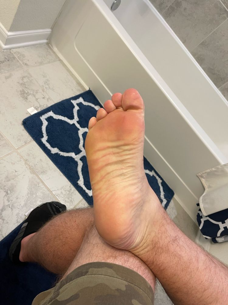 The sole of a man’s bare foot