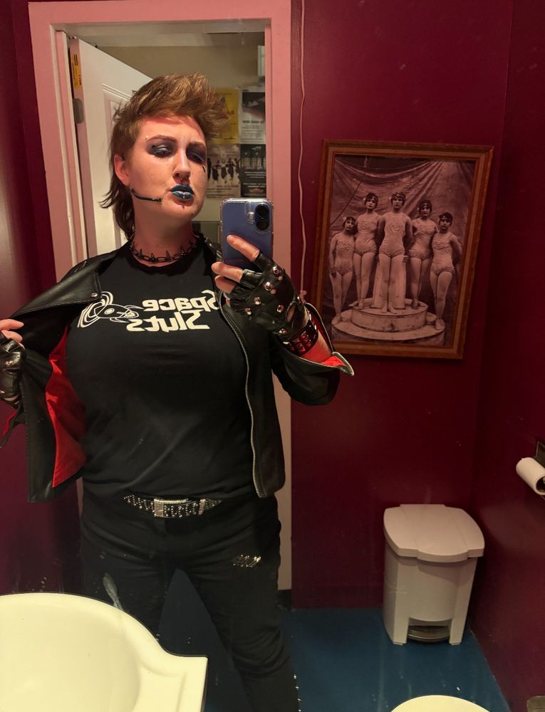 Super cool partner in costume as Eddie wearing a Space Slut shirt 