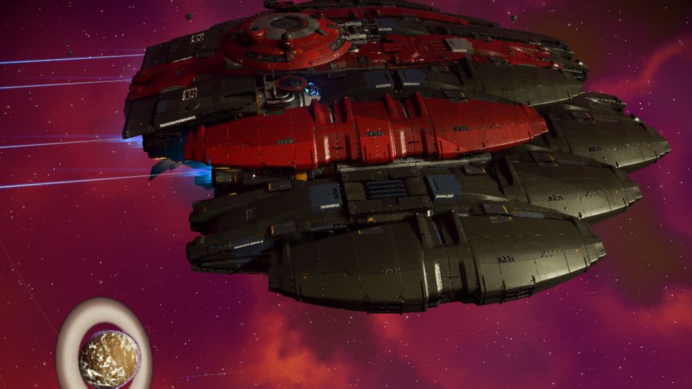 A side view of the same ship, from above.the engines can be seenshining blue at the aft, and it can be seen that the rear ofthe ship is more flattened then the curves of the rest of the ship. (see the other views)