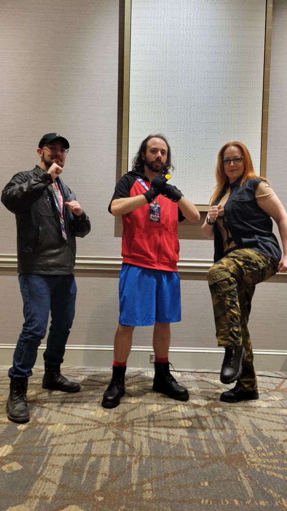 DynamiteDan, DECosmic, and Asuka424 dressed as Volt, Sion, and Kou from the ps2 videogame The Bouncer.