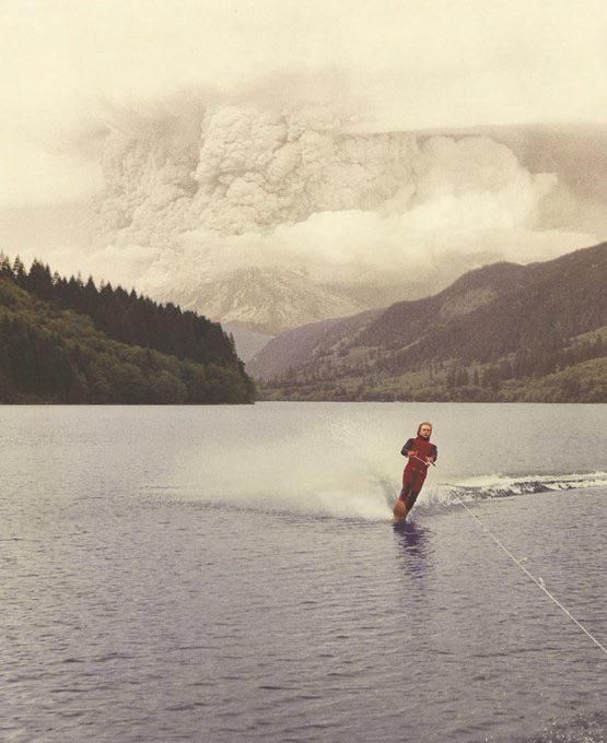 A 19-year-old Jim Hobson, of Battle Ground, is shown here water skiing on May 18, 1980, as Mount St. Helens erupts in the background. 