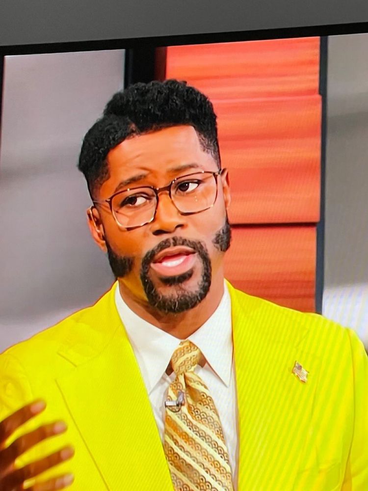 Nate Burleson in a yellow suit