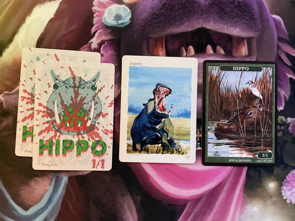 4 hippo tokens, 2 by Rope Arrow, a Kent Meyer Junior token, and a Jeff Menges one