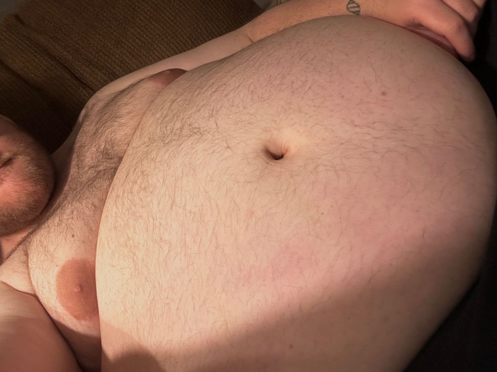 A photo of me, focused on my belly