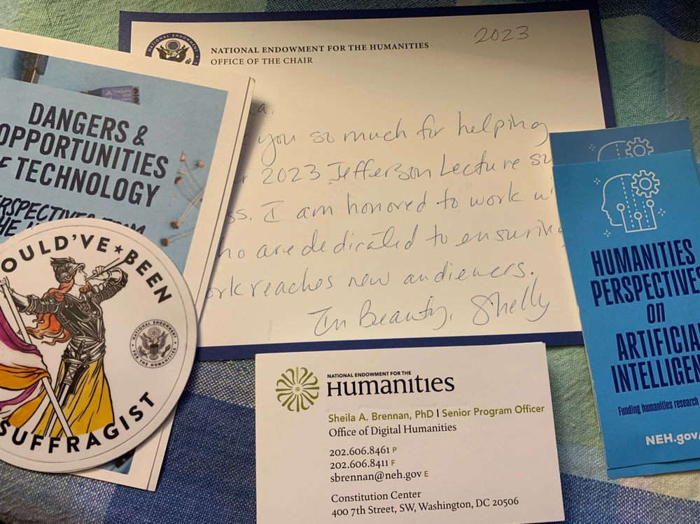 Collection of stickers, flyers, business cards, and letter.