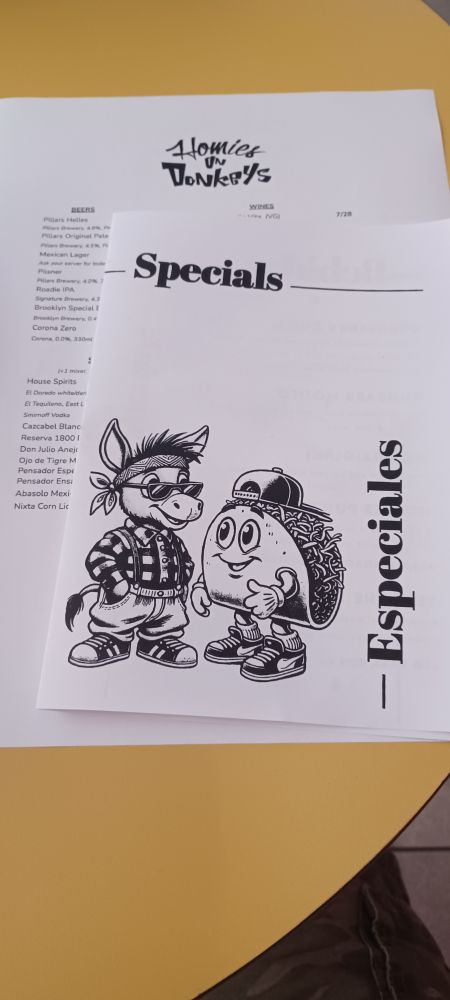 Menu of the Homies On Donkeys, showing an anthropomorphic donkey and an anthropomorphic taco.