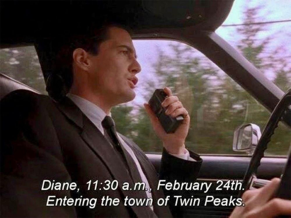 Dale Cooper driving, saying to his recorder, “Diane, 11:30am, February 24th. Entering the town of Twin Peaks.”