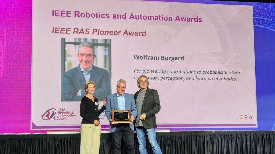 Wolfram Burgard receiving the IEEE RAS Pioneer Award, alongside Aude Billard and Seth Hutchinson.