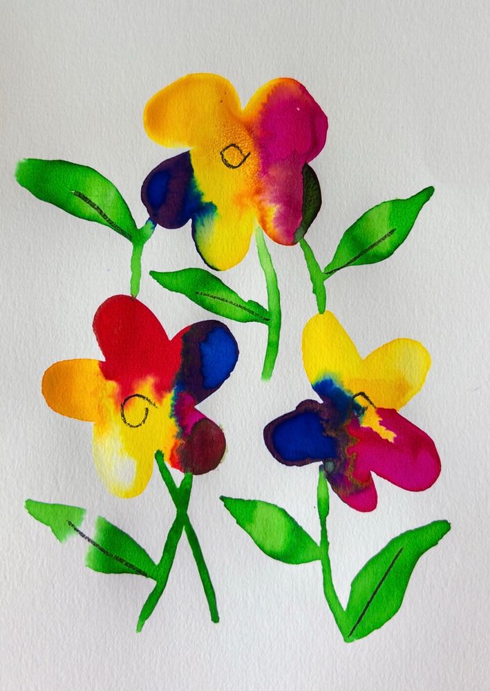 Three watercolor flowers with charcoal pencil bits