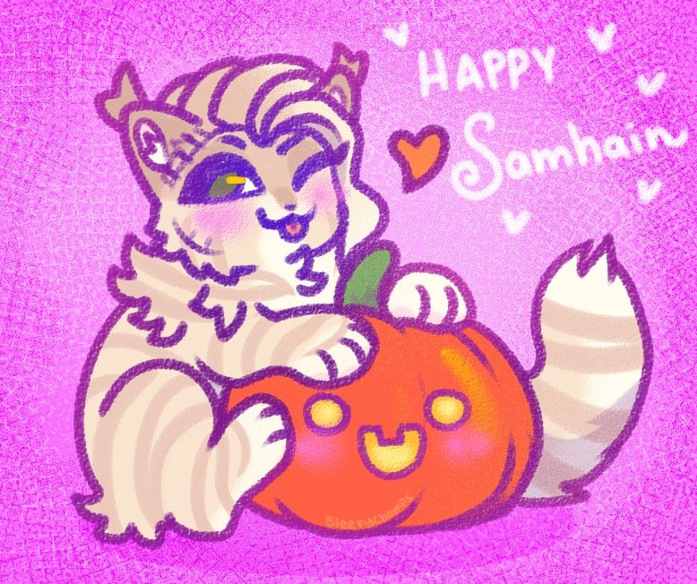 a kitten holding a pumpkin with the words "happy samhain" on the background