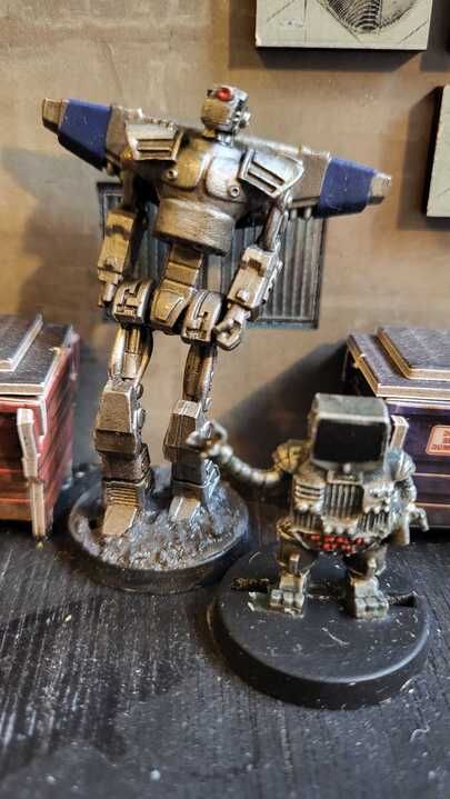 Assassinator Droid & Walter the Robot from Mongoose Publishing for their Judge Dredd range.