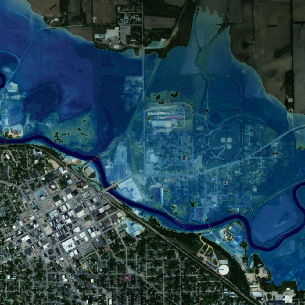 An aerial map of a city with a visual display of a flood.