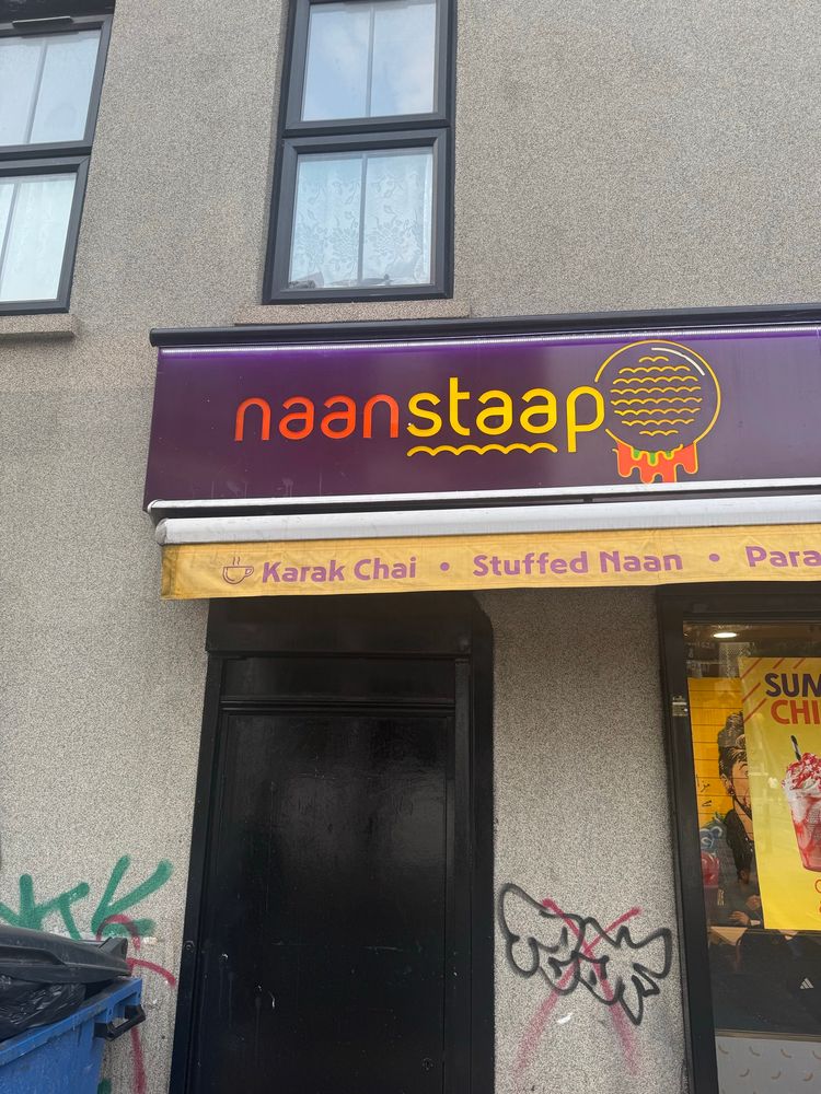 Naan and chai shop with the business name Naan Staap. 