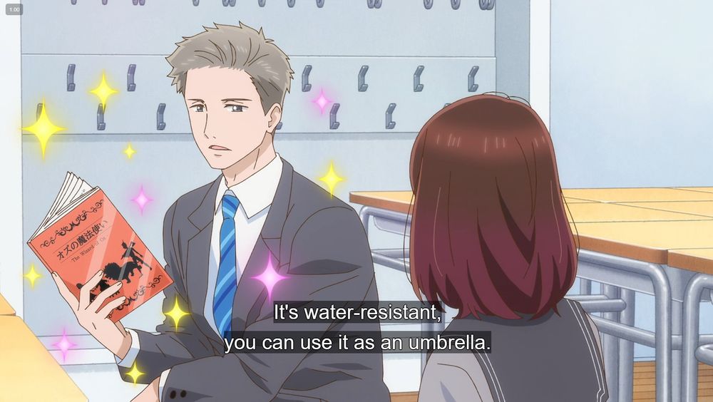 Ayukawa with sparkles holding up a laminated script. "It's water-resistant, you can use it as an umbrella." 