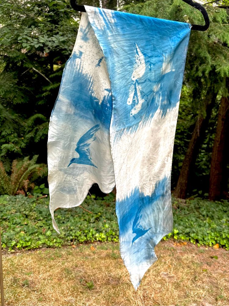 Shimmery textured silk scarf printed with terns and sandpipers in blue cyanotype 