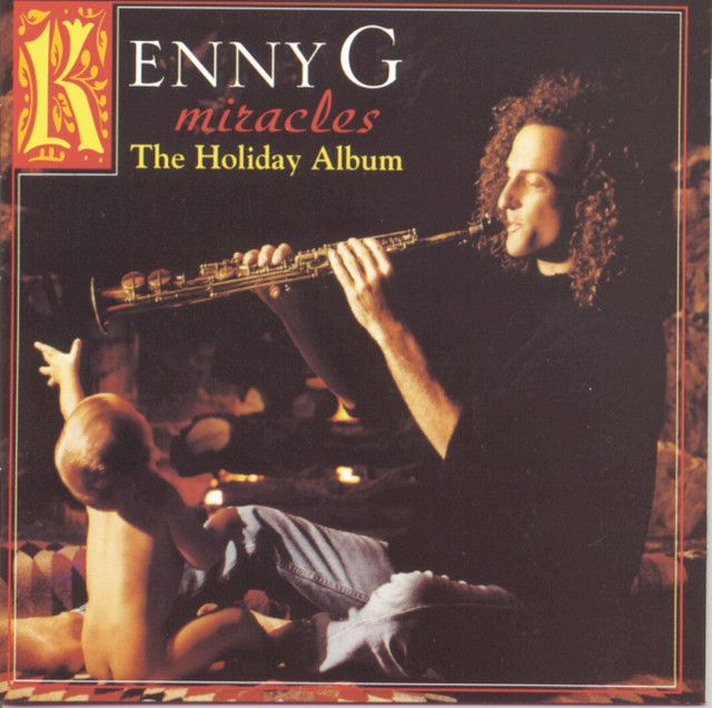 The cover to Kenny G's Miracles: The Holiday Album. Kenny plays an instrument while a baby tries to steal it from him, selfishly. 

This is the 445th album to be added to the list. 