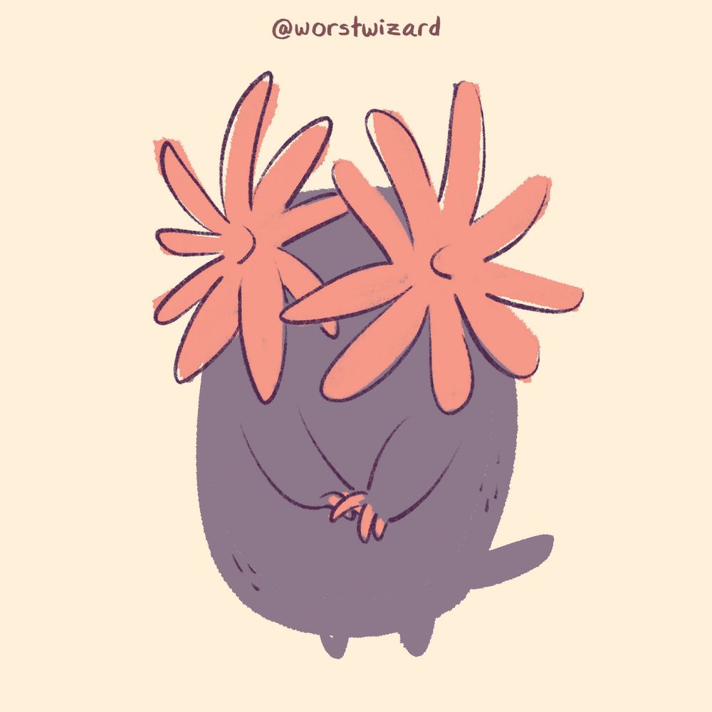 a brown and pink star-nosed mole fidgeting demurely