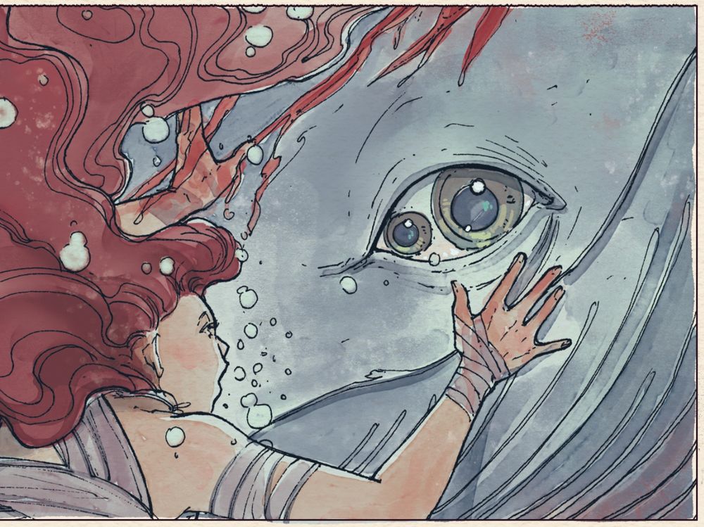 a redheaded child swimming with a whale