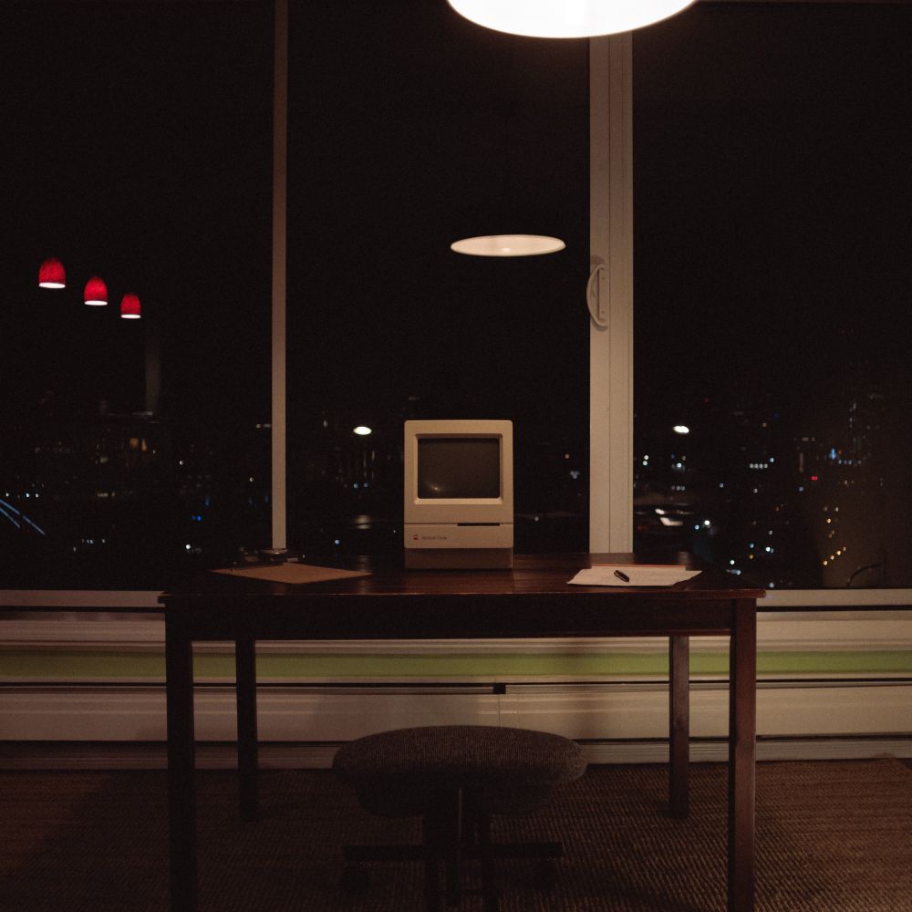 Photo of an Apple Macintosh Classic against a dark window on a table. Stylized to look vintage.

Photo taken November 2025 in Edmonton, Alberta by Jacy Eberlein. Taken on a Canon RP with a Pentax-m 28mm f2.8.