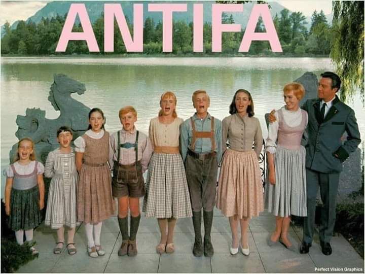 The Von Trapp family from Sound of Music with the word Antifa above in pink