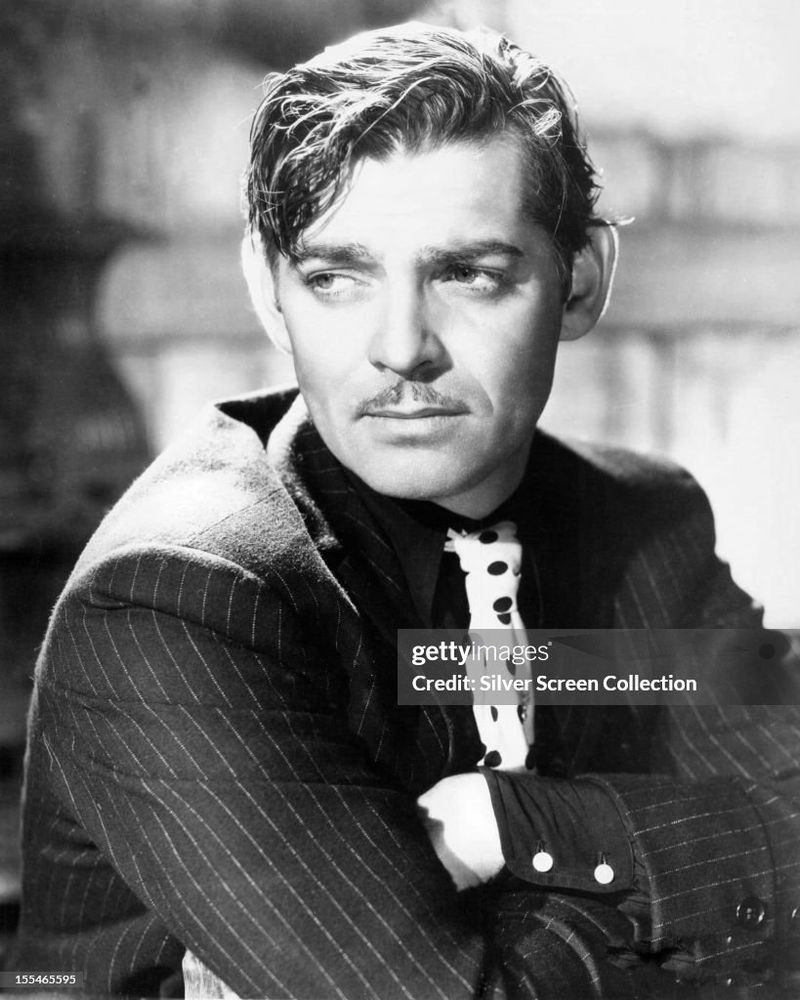 Clark Gable giving a shouldering look.