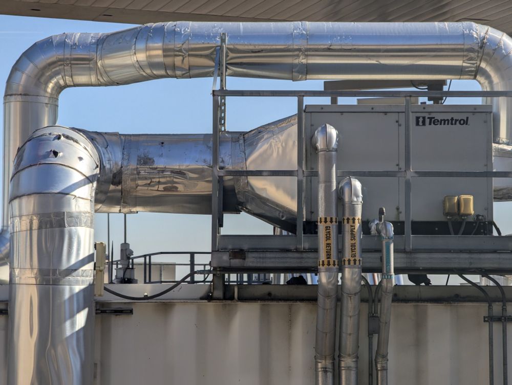 Some sort of air exchange machinery at the Dallas airport that pigeons have decided makes a good place to build their terrible nests