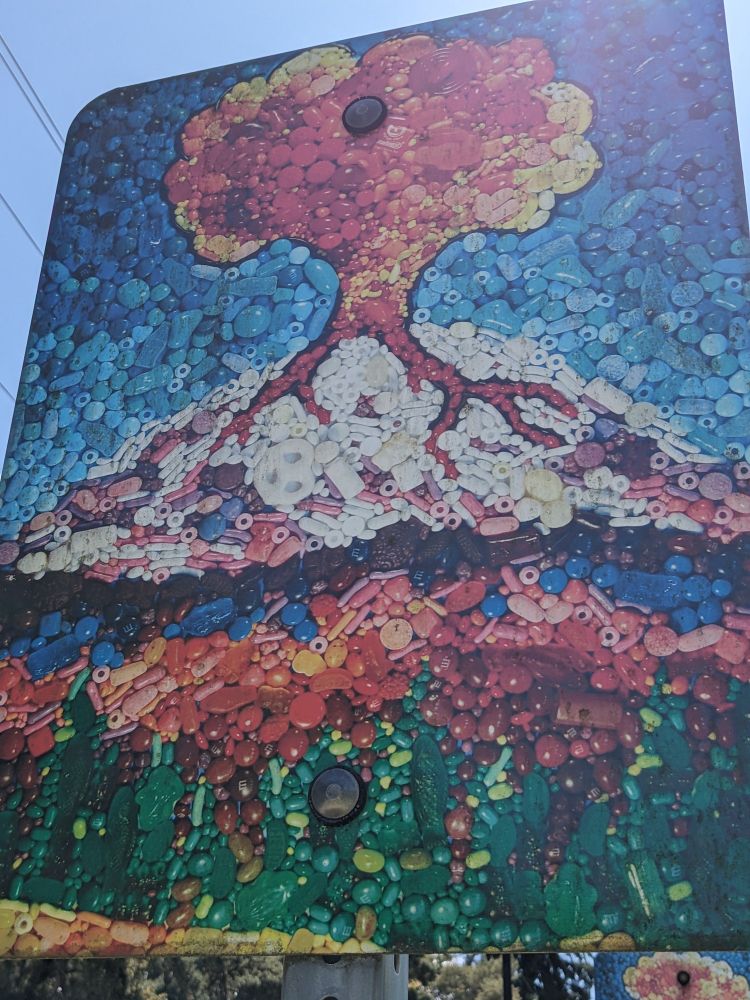 A close-up shows the volcano is composed of candy..