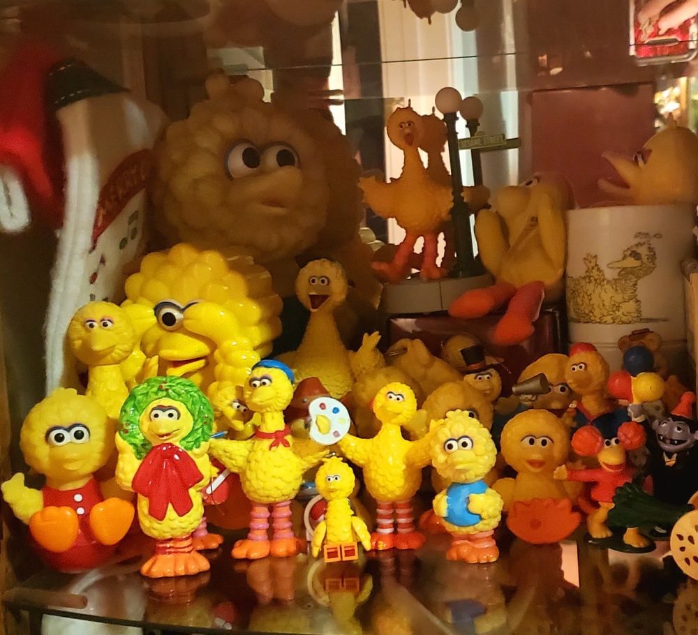 Mountain of Big Bird PVC figurines and plush toys. 