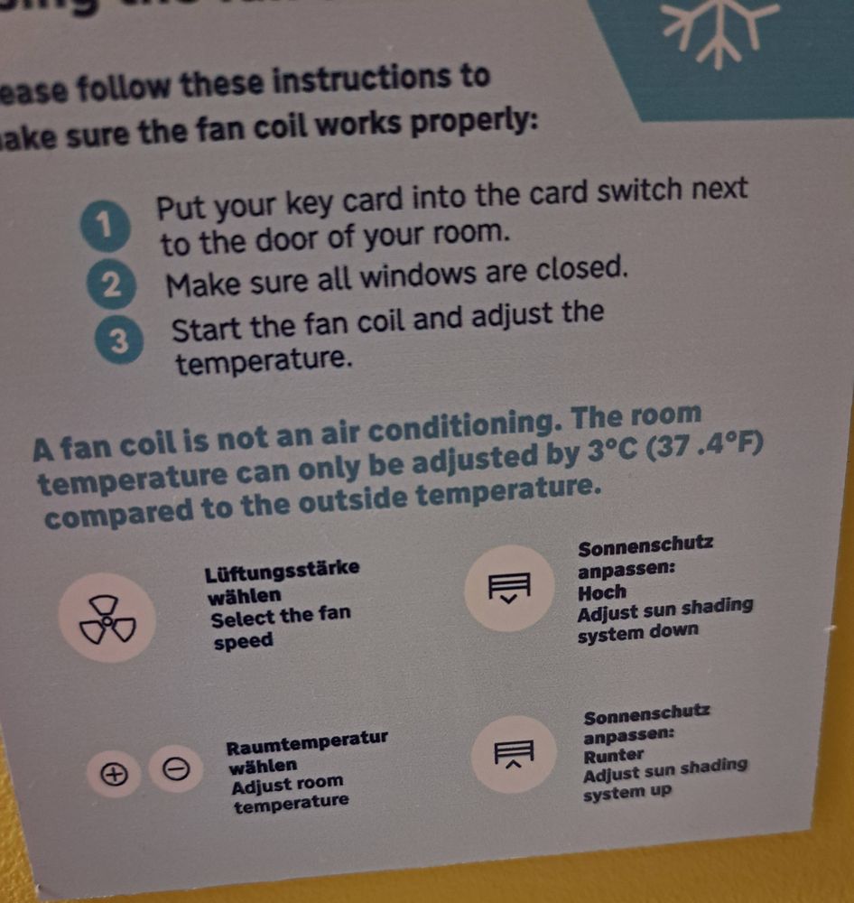 Sign explaining how a fan coil cooling system works, in particular "The room temperature can only be adjusted by 3°C (37.4°F) compared to the outside temperature".