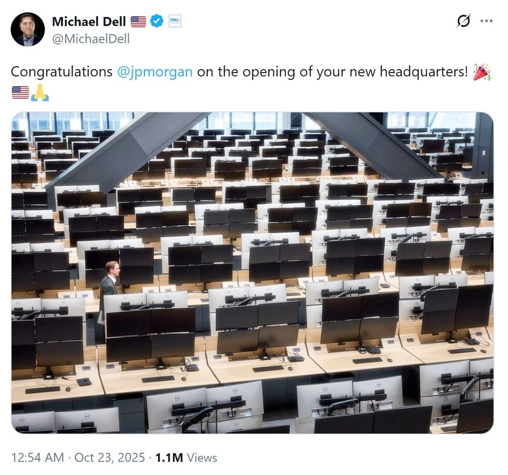 picture of JP Morgan's "new headquarters" with hundreds of standing desks in an open configuration